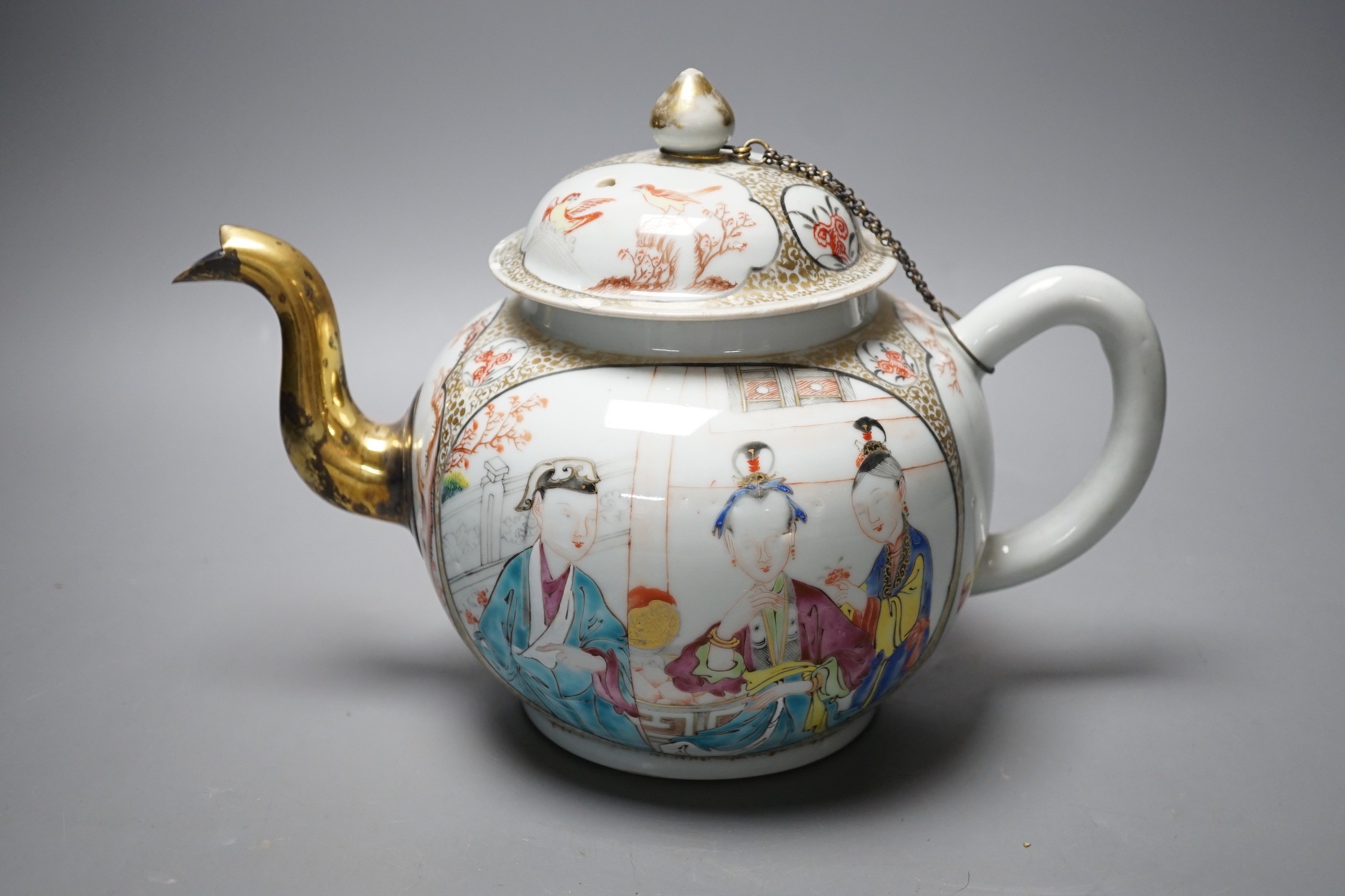 A large Chinese famille rose fencai teapot and cover, Qianlong period, replacement gilt metal spout, cover with restored chips, 20cm tall